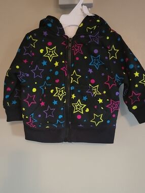 NWT black fleece lined zip up hoodie with colorful star print